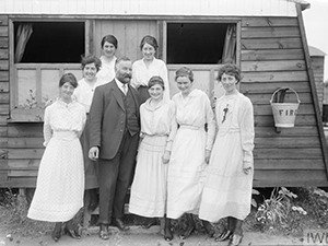 Walter Tarrant and women carpenters outside huts near Calais 1917